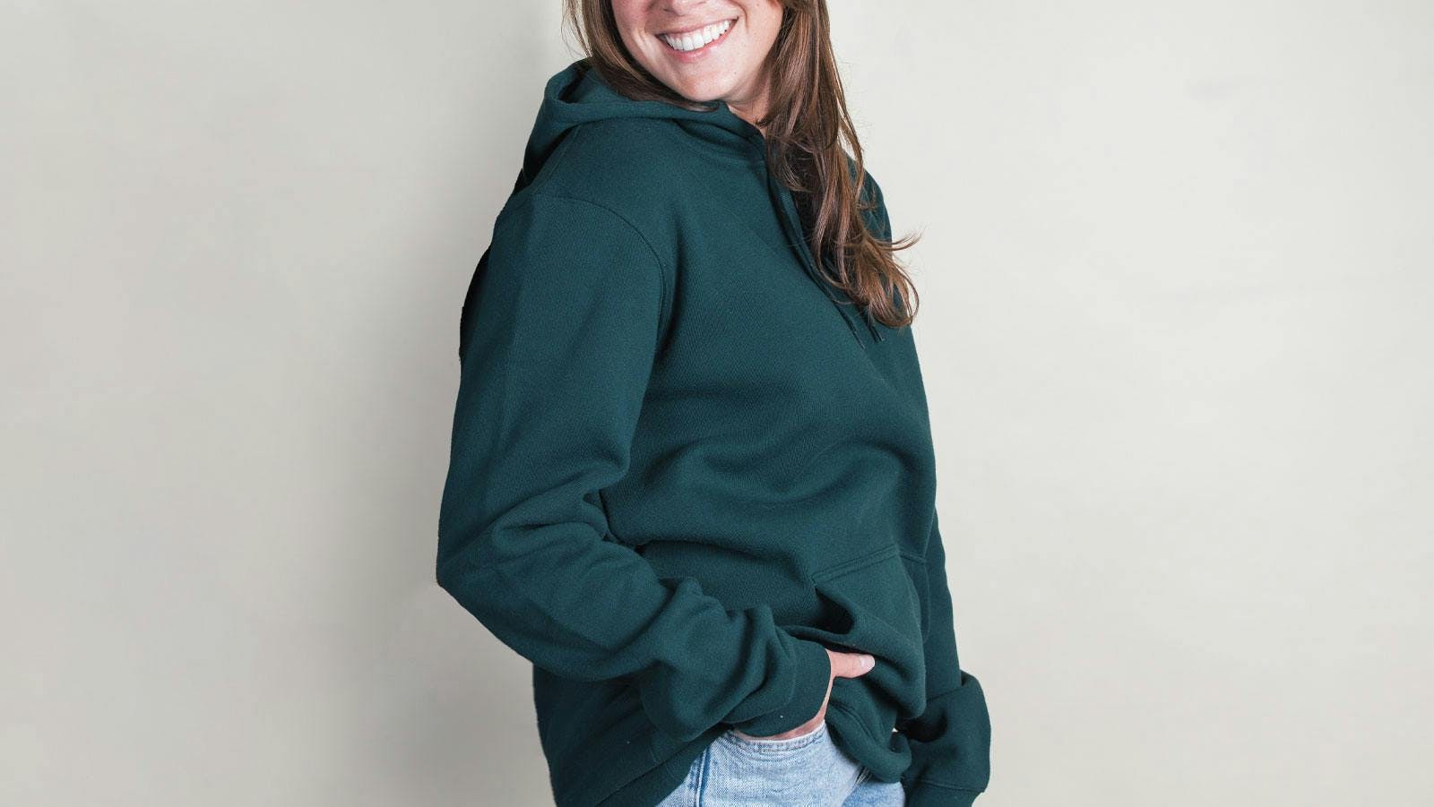 women wearing a green hoodie