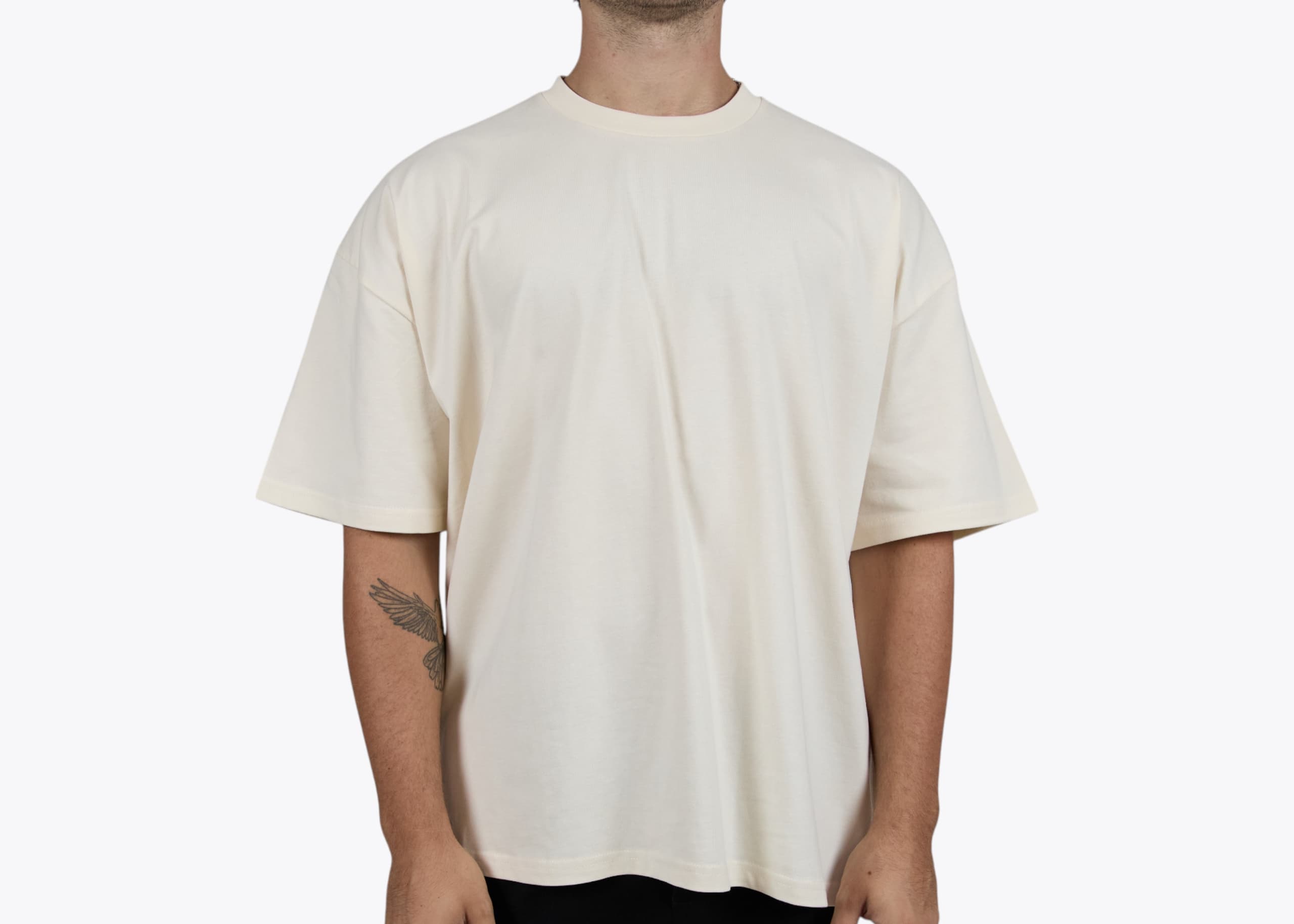 AS Colour 5069 Classic Oversized Tee in Ecru (model:male, size:medium, view:front)