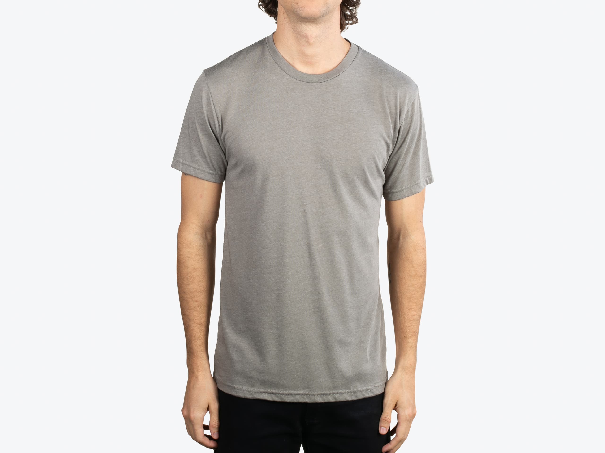 Next Level Apparel 6010 Unisex Tri-Blend T-Shirt in Venetian Gray (model:male, size:medium, view:front)