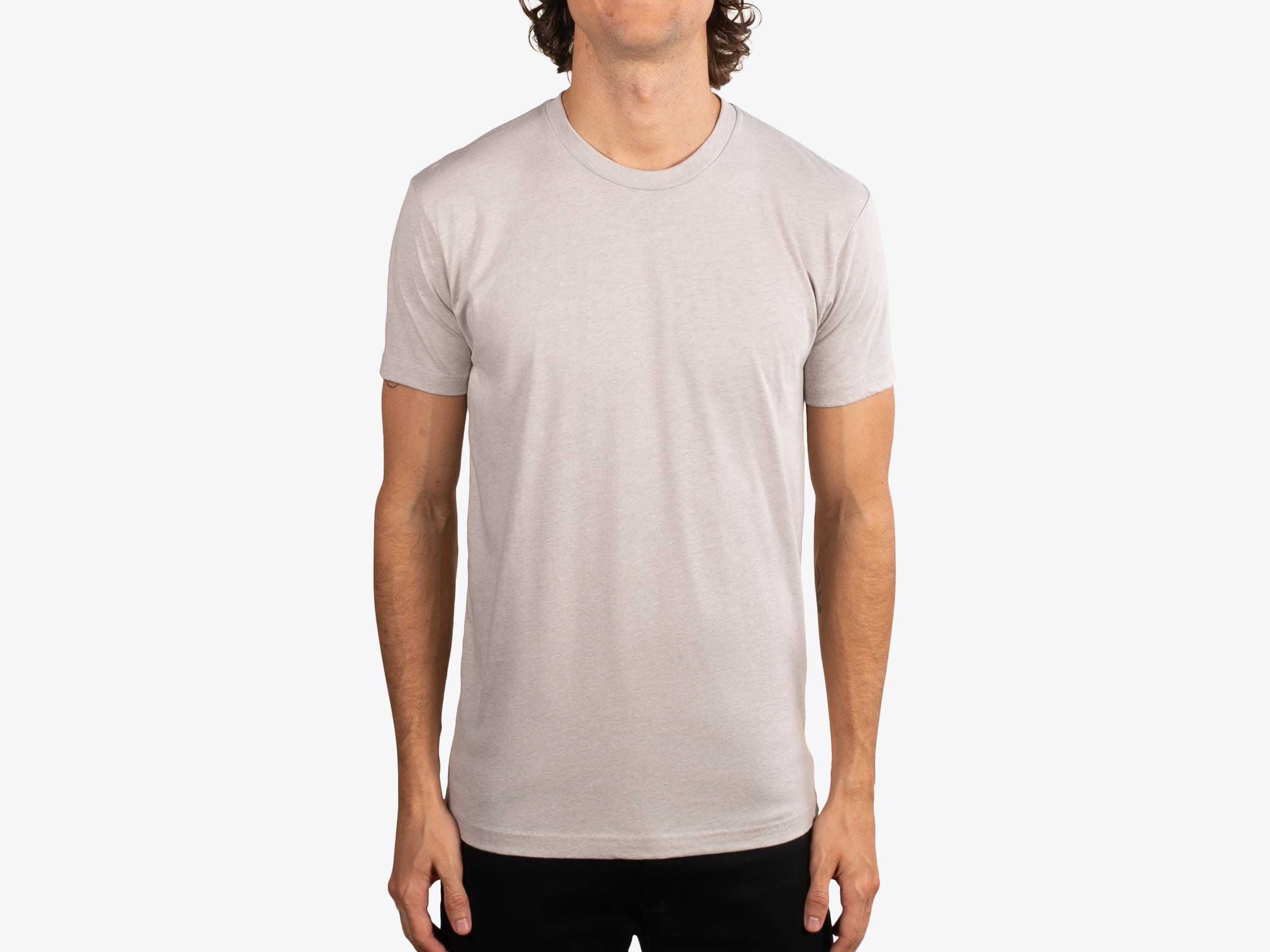 Next Level Apparel 6210 Premium CVC Short Sleeve Crew in Sand (model:male, size:medium, view:front)