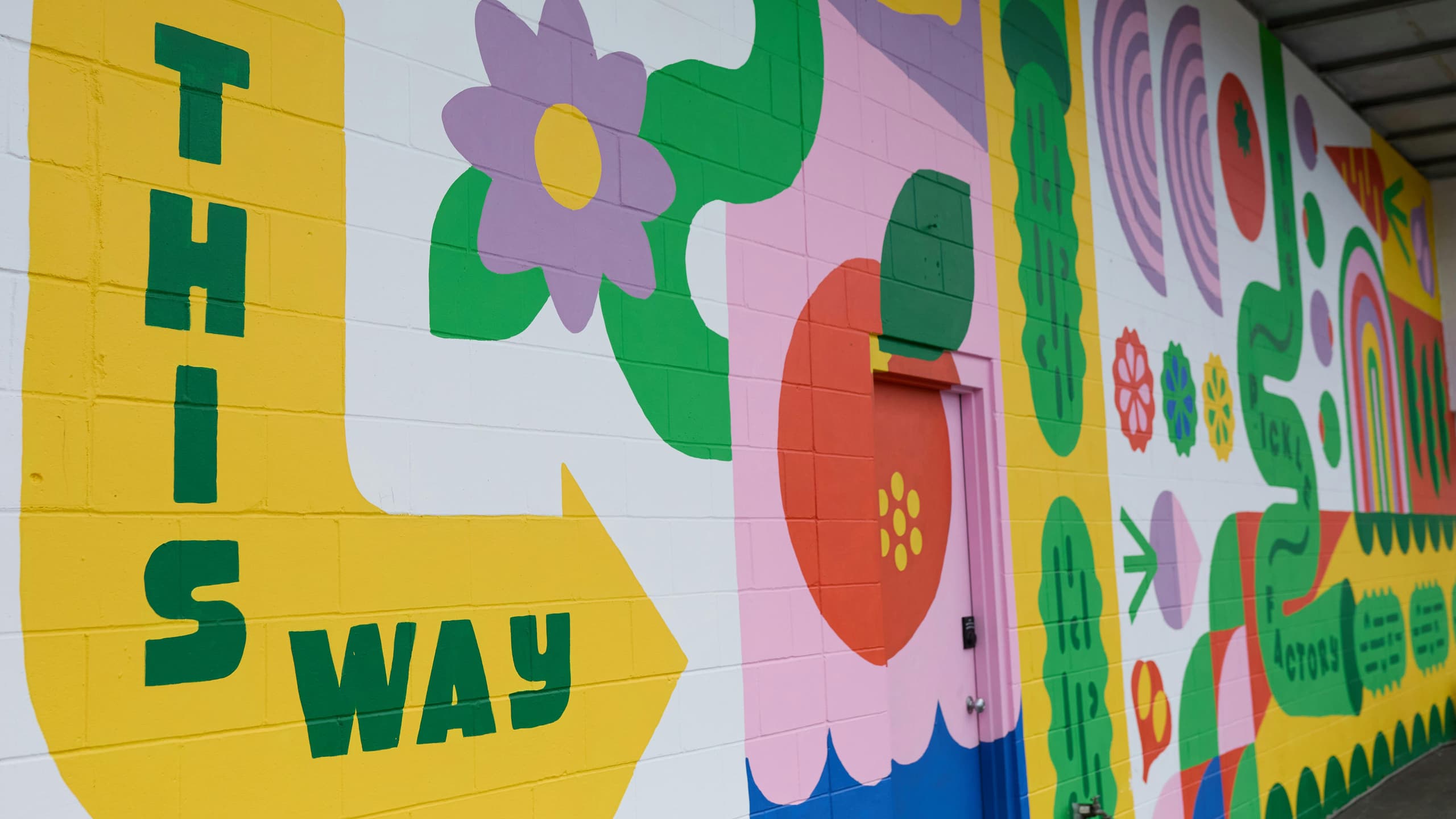 outside mural at the Pickle Factory